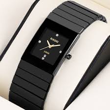 RADO  Men's Luxury Black Ceramic Watch with Gold Hands & Date Display"